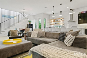Picture-Perfect Trendy Vibes Minutes From Rainey